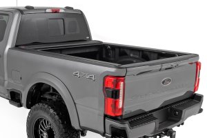 Ford F-350 Super Duty Retractable Bed Cover - Rough Country - Weather-resistant Vinyl with Rigid Aluminum Panel - Matte Black - '17-'24
